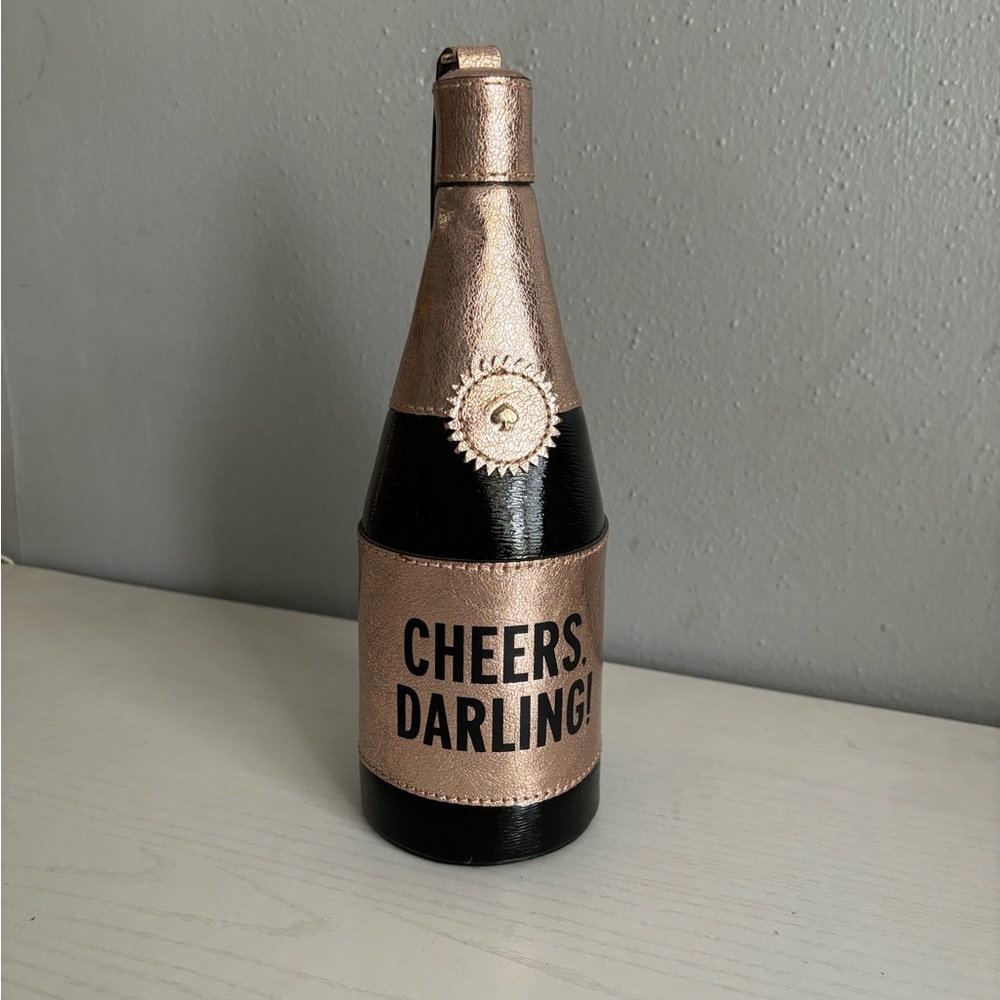 kate spade cheers darling champagne bottle wristlet